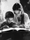 Black and white portrait of mother teaching young son in a study, realistic and retro