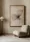 Traditional wooden chair, modern metal-based lamp, in a well-lit, inviting room.