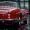 High resolution image of a vibrant red car.