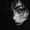 Dramatic black and white portrait of a woman.
